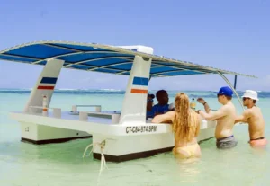 The floating bar serving guests standing in shallow water