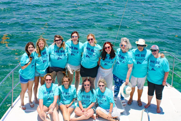 A corporate group on deck during an incentive charter