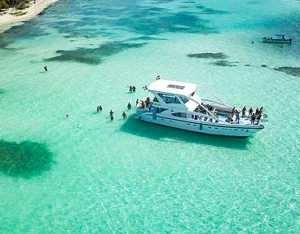 The catamaran anchored off a Caribbean beach