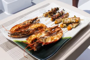 Grilled Caribbean lobster plated on board