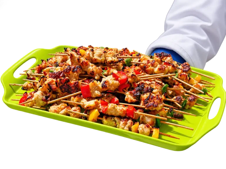 A server holding out a tray of grilled chicken and vegetable skewers